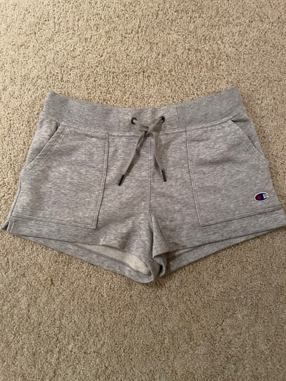 Champion Women’s Light Gray Athletic Drawcord Shorts. 3 pockets . Size small.